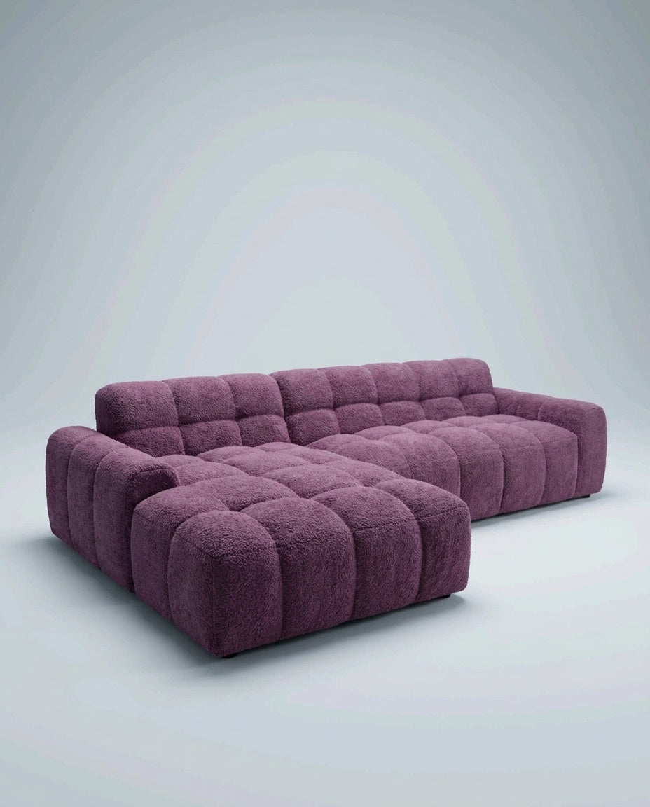 The Marshmallow Sectional — Plum Bouclé — three-quarter view
