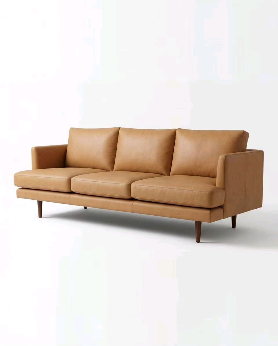 The Nordic Sofa — Tan Leather in a living room