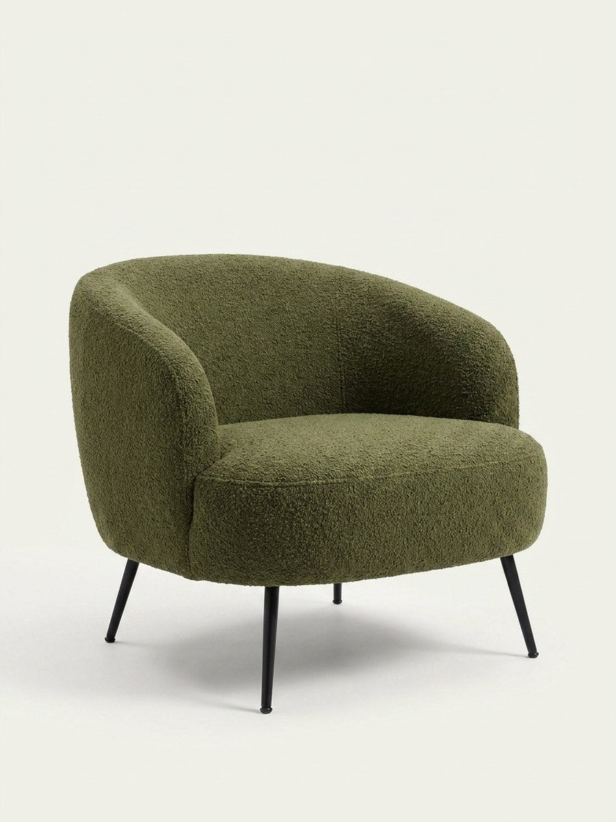 The Nook Chair — Olive Green in a living room