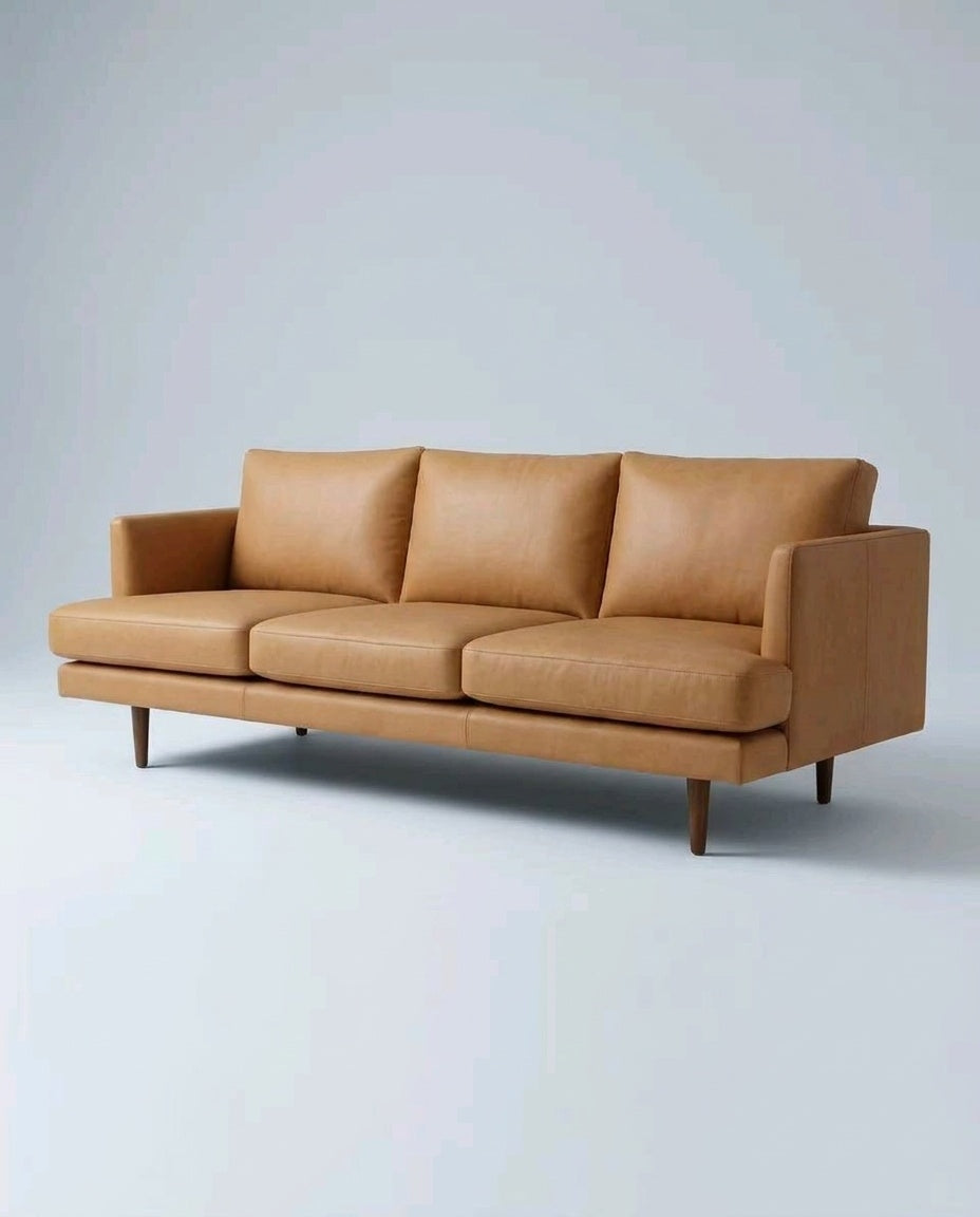 The Nordic Sofa — Tan Leather — three-quarter view
