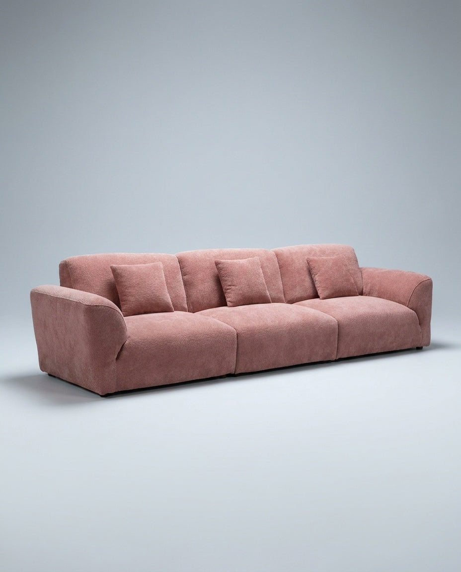 The Lounger Sofa — Rose Corduroy — three-quarter view