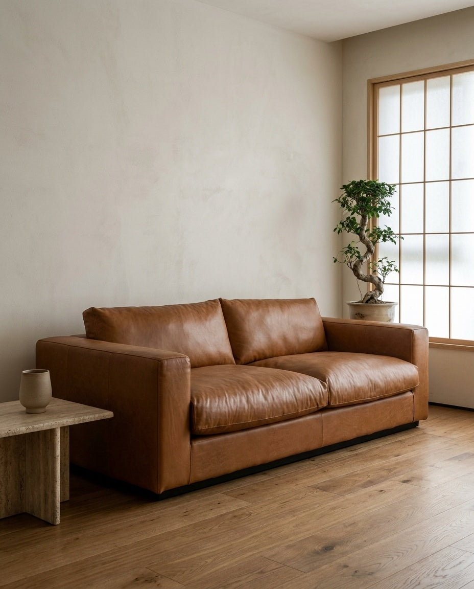 The Frae Loveseat — Cognac Leather styled in a living room