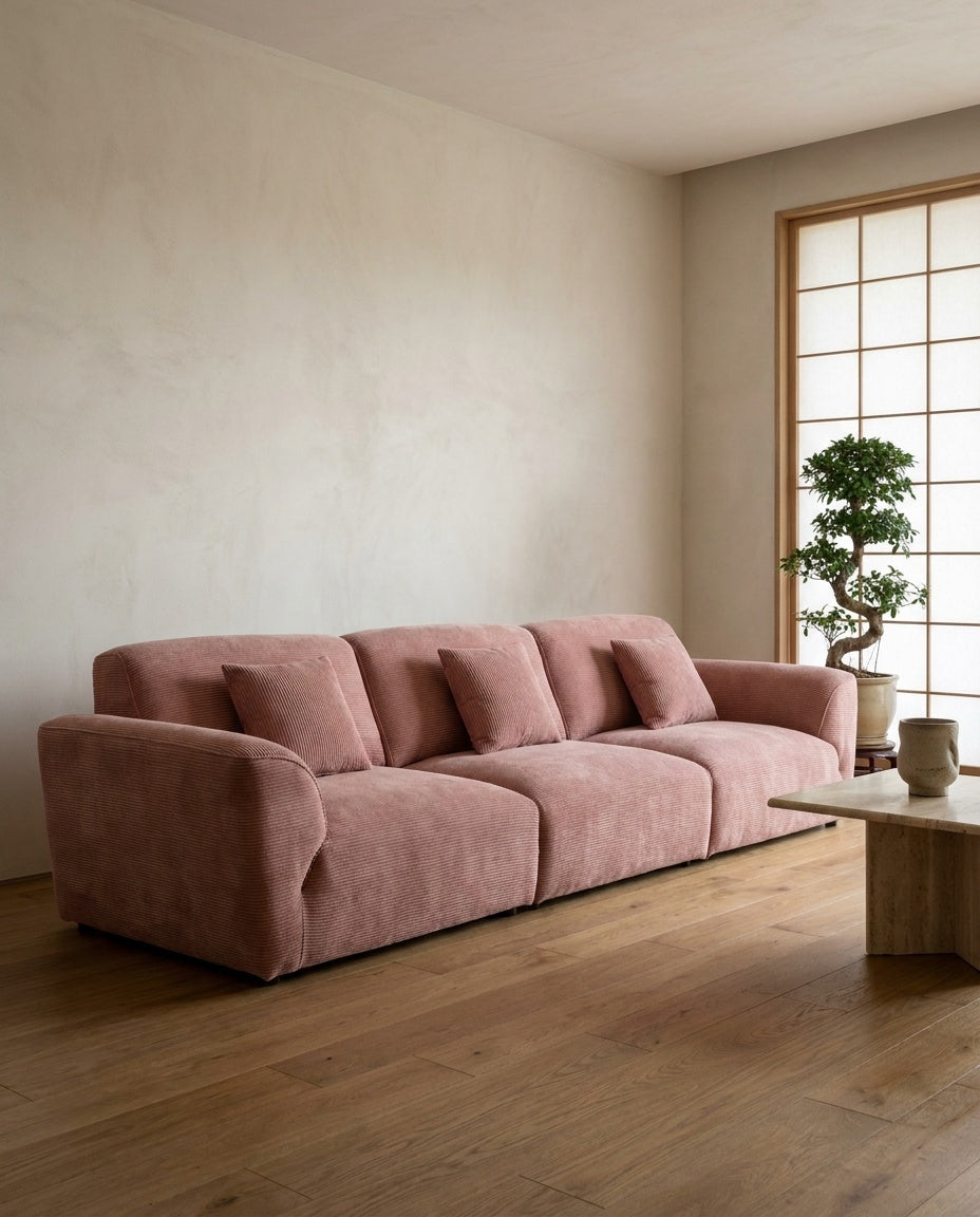 The Lounger Sofa — Rose Corduroy styled in a living room