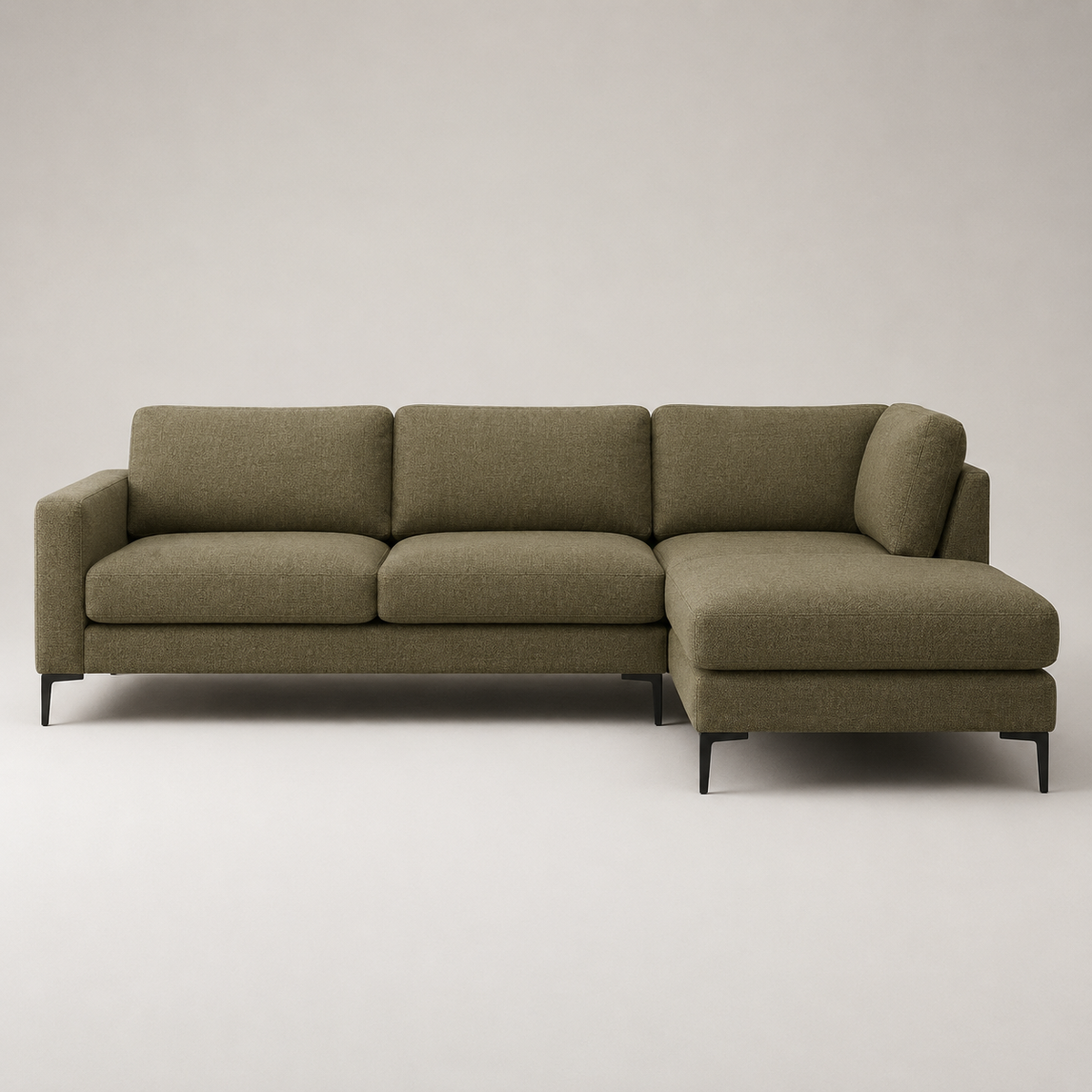 The Frae Chaise Sofa — Olive Green Fabric in a living room