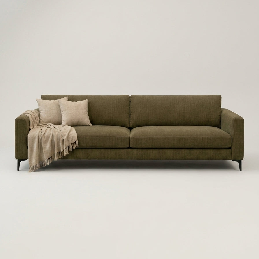 The Frae Sofa — Olive Green in a living room